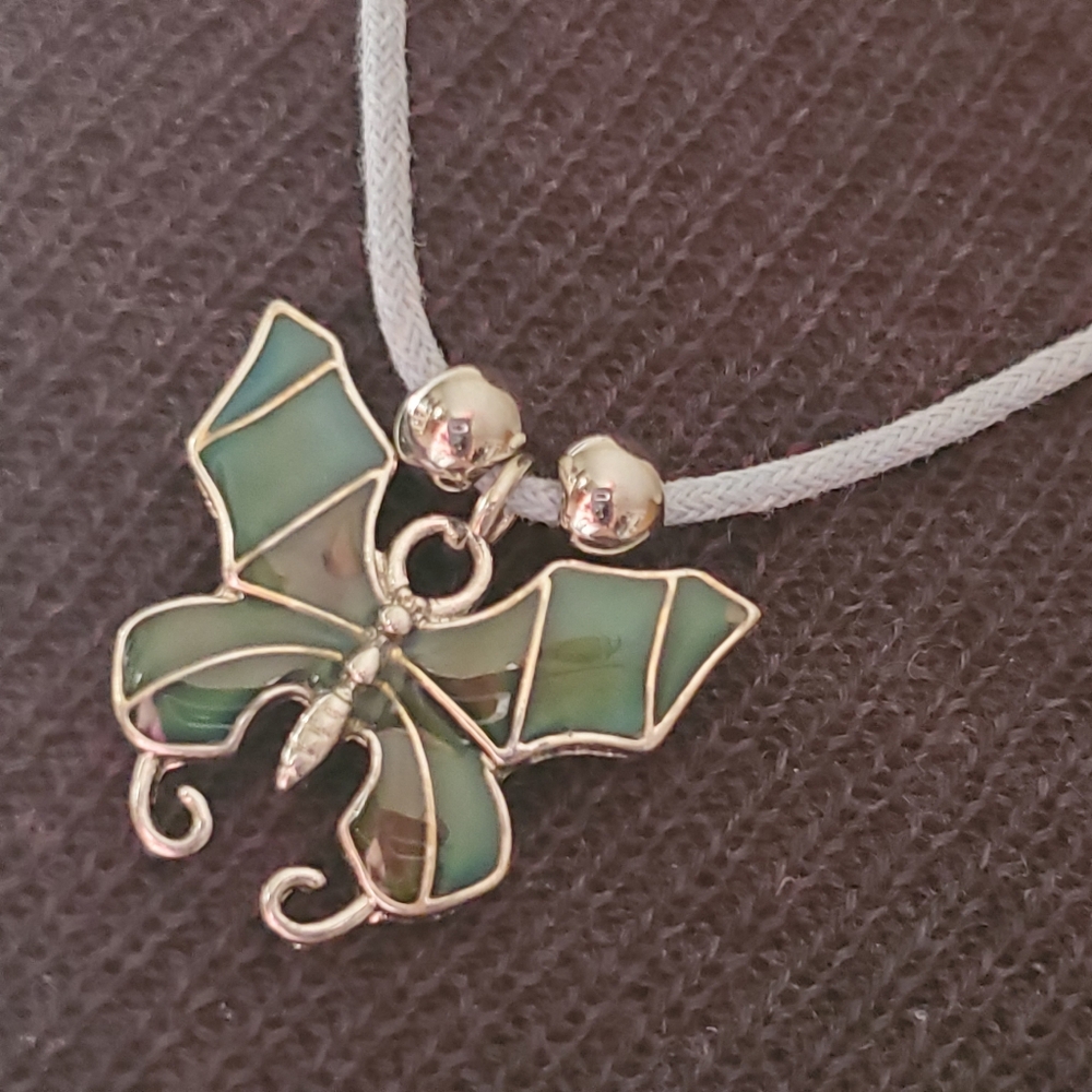 Cool Jewels boho 90s vibes butterfly necklace on gray cord